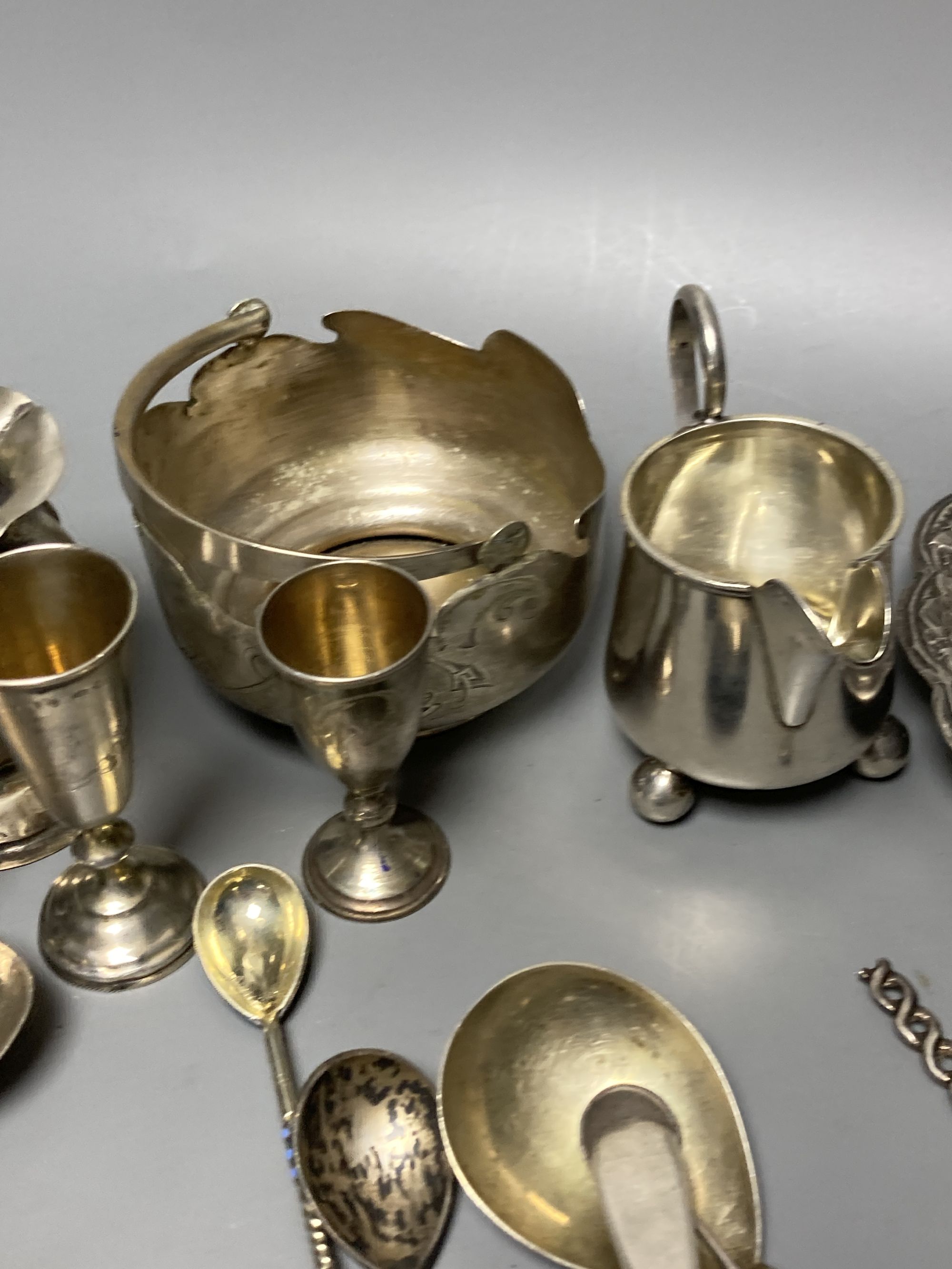 A small quantity of Russian style metal items including spoons (some with enamel) dishes, bowl etc.